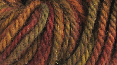 Autumn: hand dyed, bulky rug weight, 100% wool spot dyed yarn in soft golds and reds with olive green for rug hooking and punching.