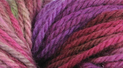 Lupine: hand dyed, bulky rug weight, 100% wool spot dyed yarn in pinks and purples with summer green for rug hooking and punching.