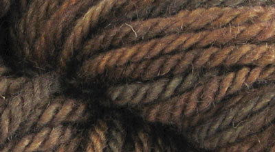 Wild Turkey: hand dyed, bulky rug weight, 100% wool spot dyed yarn in dark mottled browns, bronze, and black for rug hooking and punching.
