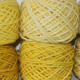 Tansy: yellow, hand dyed, worsted weight, 100% wool yarn in 8 color values for fine shading for rug hooking and punching.